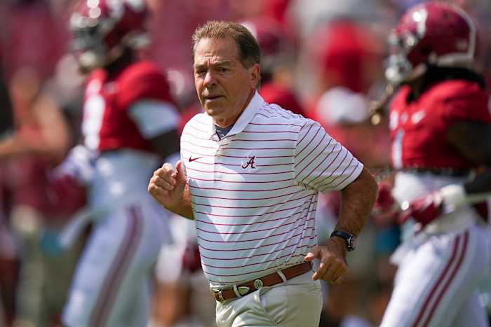 Alabama Crimson Tide head coach Nick Saban jogs on the field at Bryant-Denny Stadium in Tuscaloosa, Alabama.